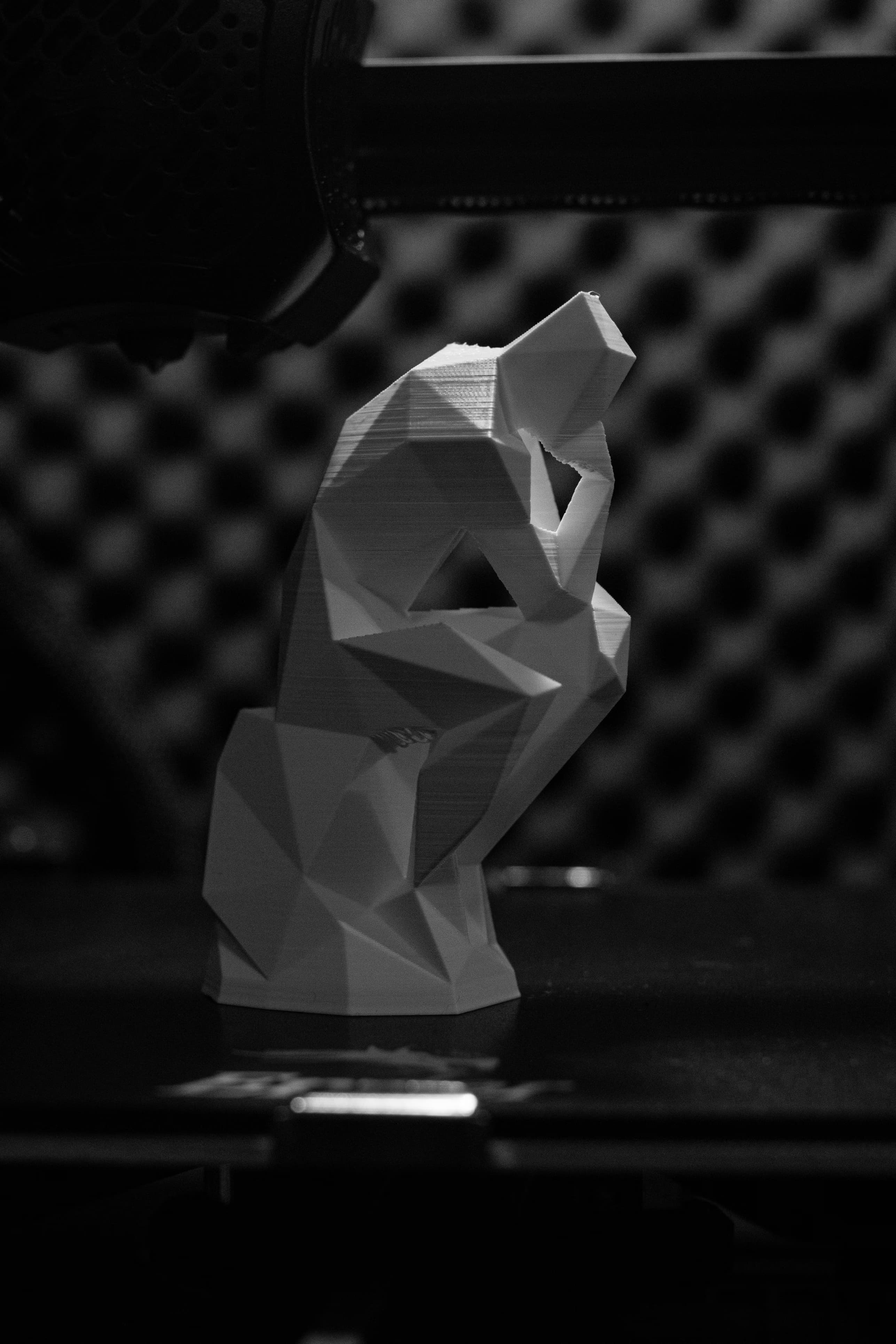 Low-poly Thinker sculpture