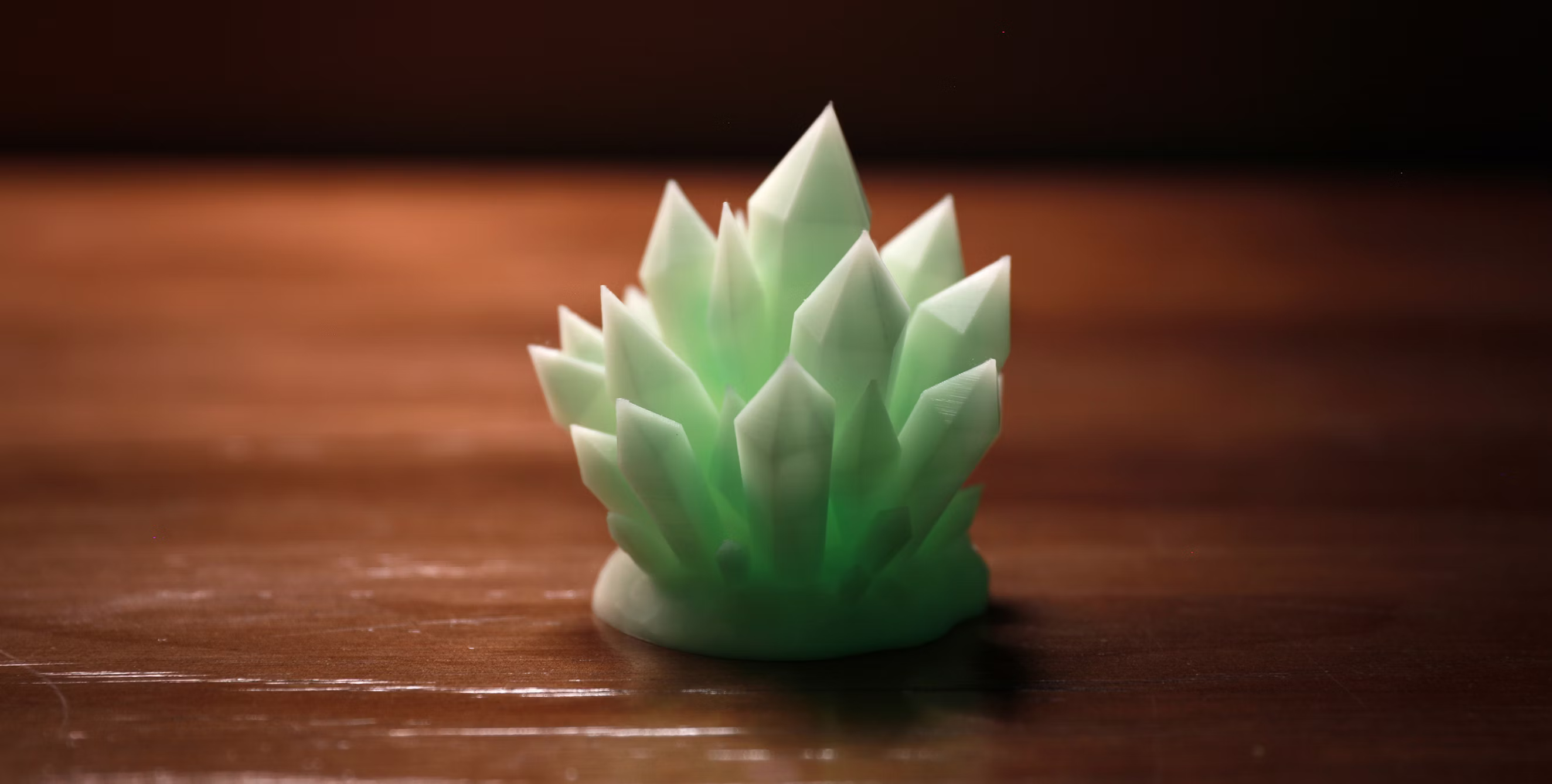 Green crystal figurine macro